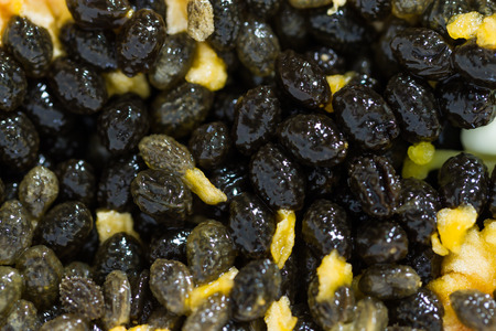 closeup texture of papaya seedsの写真素材