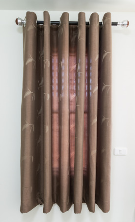 design of dark brown window curtainの写真素材