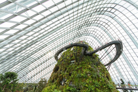 SINGAPORE-JULY 6: Cloud Forest Dome at Gardens by the Bay on July 6, 2014 in Singapore. Spanning 101 hectares of reclaimed land in central Singapore, adjacent to Marina Reservoir.