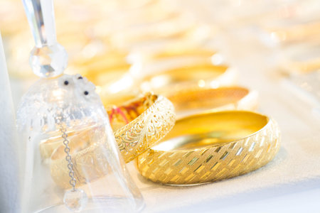 gold bangles shown in shop