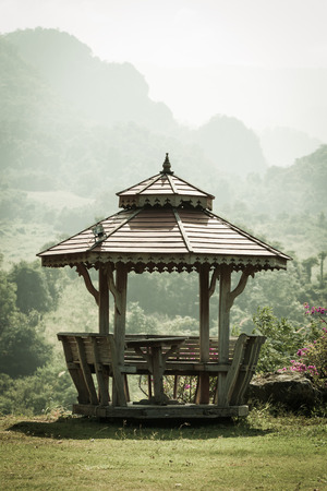 old wooden pavilion in gardenの写真素材