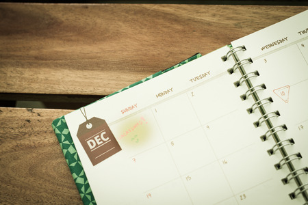 note for vacation date in notebookの写真素材