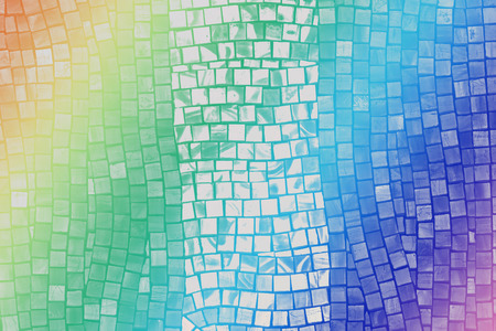 rough rainbow mosaic tile wall in bathroomの写真素材