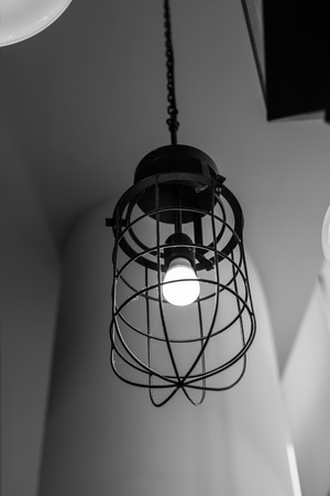 vintage lamp hanging from ceilingの写真素材