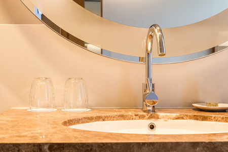 modern style washbasin and faucetの写真素材