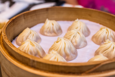 chinese style food called xiao long bao, minced pork and crab dumpling with soup insideの写真素材