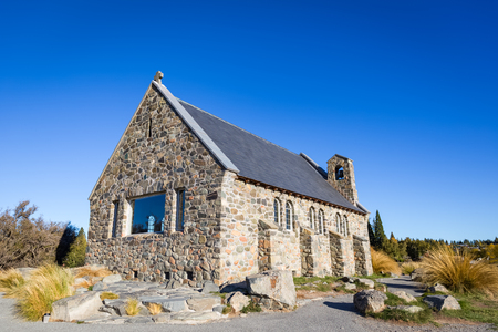 Church of the Good Shepherd with clear blue sky at Lake Tekapo in New Zealandの写真素材