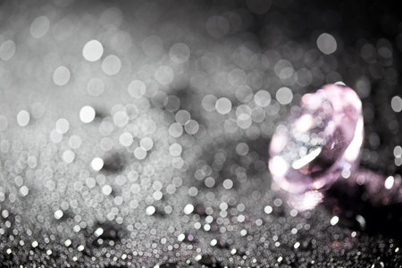 clear crystal with water drops on black backgroundの写真素材