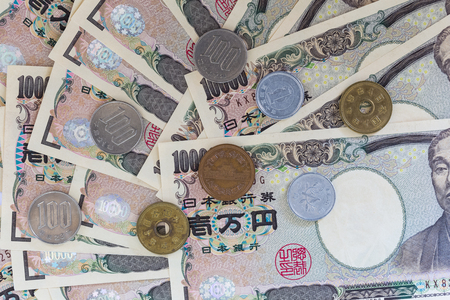closeup japanese banknotes and coinsの写真素材