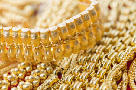 closeup group of gold necklacesの写真素材
