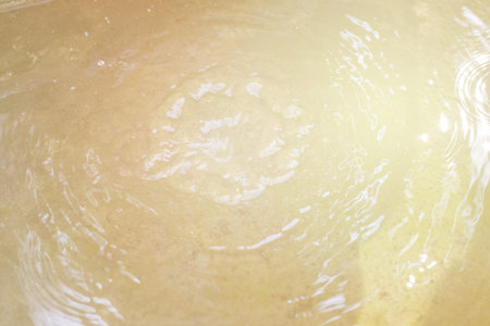 water splash in golden toneの写真素材