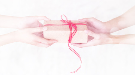 present given from hands to hands on special occassionの写真素材