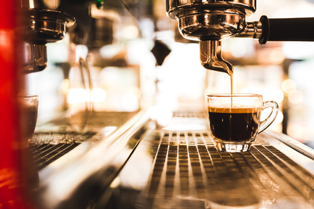 closeup coffee machine making espressoの写真素材