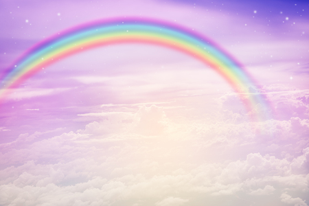 texture of cloud with rainbow on blue skyの写真素材