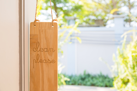 please make up room sign hanging besides door, hospitality conceptの写真素材