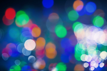 colorful bokeh background from light blubs and water drops