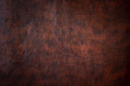 closeup textured of dark brown leather surfaceの写真素材