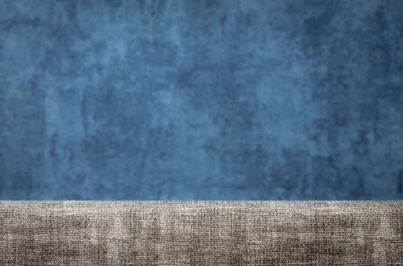 gray cushion on blue background for product display or montage usedの写真素材