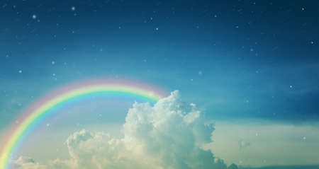 texture of cloud with rainbow and snow in blue skyの写真素材