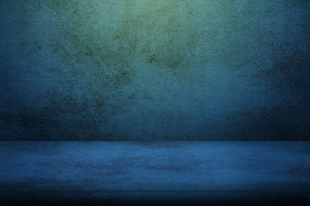 closeup dark blue velvet fabric sofa with light above for product display or montage usedの写真素材