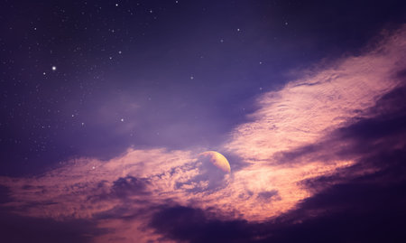 colorful night sky with cloud, stars, and moon in violet and pink toneの写真素材