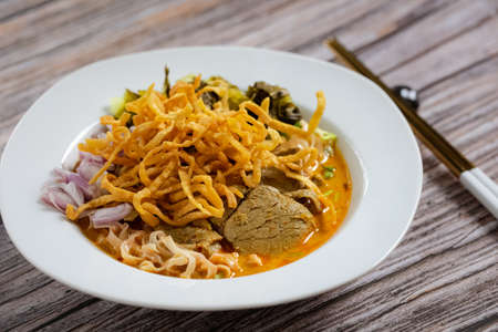 Khao soi, northern thai style curry noodle with beefの写真素材