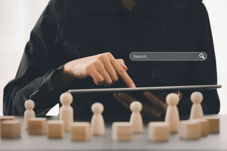 hand of businesswoman pointing on tablet with blank search bar, Search Engine Optimization SEO Networking Conceptの写真素材