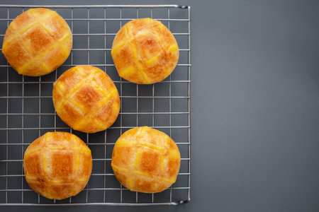 top view homemade soft and fluffy potato bun on rack, homemade bakingの写真素材