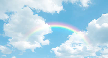 texture of cloud with rainbow on blue skyの写真素材