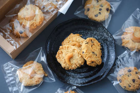 chocolate chip and nut cookies with packaging for advertisingの写真素材