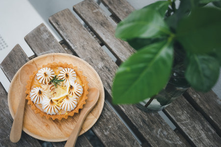 top view lemon tart on wood table