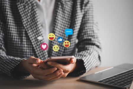 woman using smart phone with emotional icons, social media and digital life concept