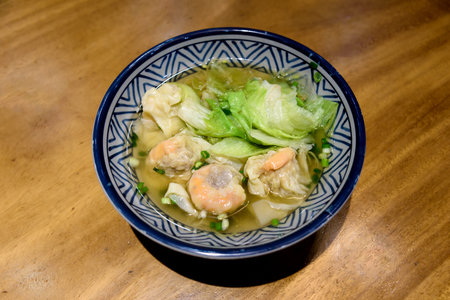 Chinese cuisine, the traditional delicious Cantonese dish, Shrimp Wonton Noodles.