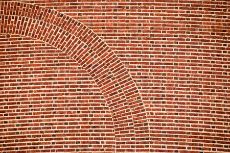 Arch shape in brick wallの写真素材