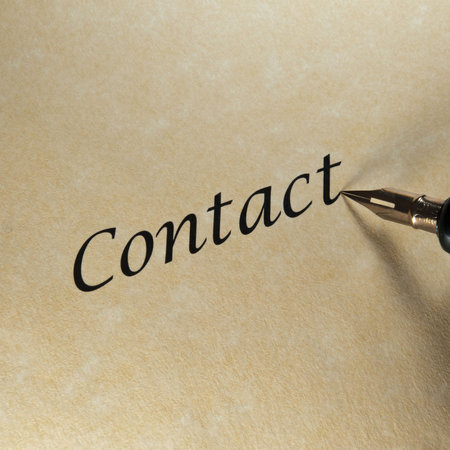 concept of contact with a pen, texts and paper.