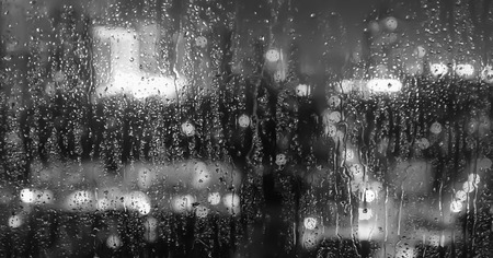 Rain falling on the glass panelの写真素材