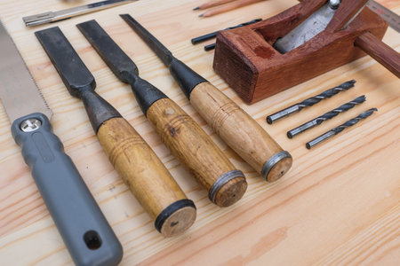 Wood chisel on the wooden tableのeditorial素材
