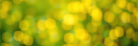 Golden bokeh lights create a warm and vibrant atmosphere in a garden during a sunny afternoonの素材