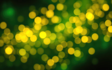 Twinkling yellow lights create a magical atmosphere in a green backgroundの素材