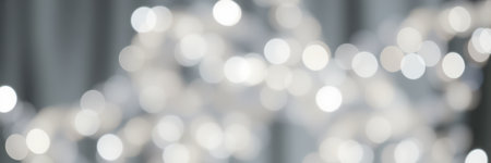 Delicate bright lights create a magical atmosphere during a festive celebration in a cozy indoor settingの素材