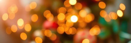 Festive decoration with blurred lights and ornaments creating a warm atmosphere during the holiday seasonの素材