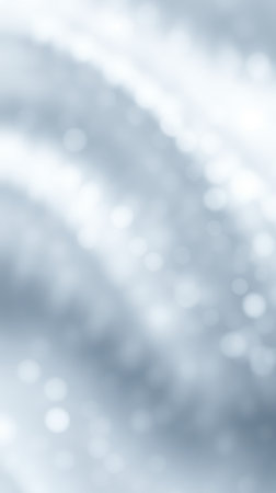 Soft blue light creates an ethereal atmosphere with shimmering bokeh effectの素材