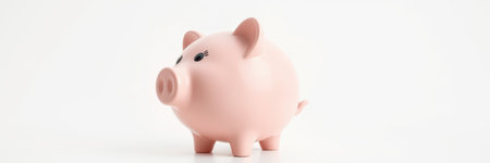 Porcelain piggy bank on a white background capturing the concept of saving money and financial planningの素材