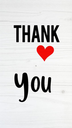 Thank you message expressed in a creative design on a wooden background showing appreciation and gratitudeの素材