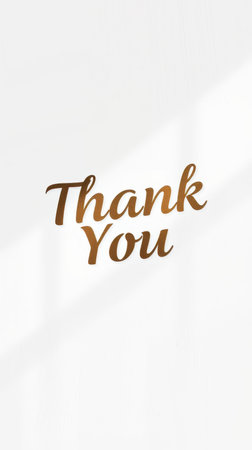 Elegant thank you message displayed with a stylish font on a light backgroundの素材