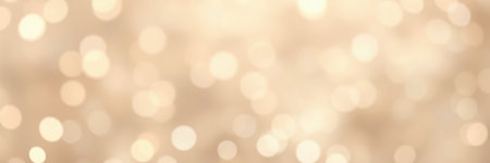 Sparkling golden background with bokeh effect creating a festive atmosphere for celebrations and eventsの素材