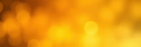 Warm golden bokeh created by light reflections during a festive evening celebration outdoors in autumn seasonの素材