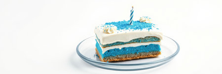 Bright blue cake slice with birthday candle and cream frosting on a clear plateの素材