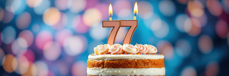 Celebrating 77 years of life with a beautiful cake adorned with candles and colorful bokeh backgroundの素材