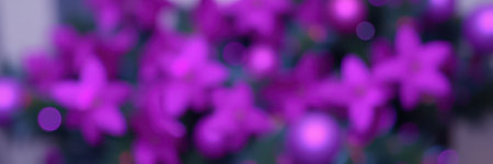 Vibrant purple flowers bloom in a garden during spring, creating a stunning burst of color in natureの素材